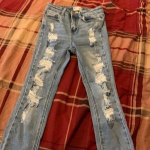 Light blue ripped jeans in size 0/24. Has 2 minor rips on the belt part.